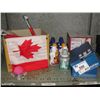 Image 1 : SHELF LOT OF CANADIAN FLAGS, SODA MIX, WHISTLEING TEA KETTLE AND PAIR OF CHILDS SHOES