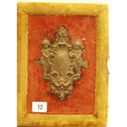 Victorian photograph album with bronze cherubs decorating cover, to include family photographs…