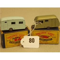 Two early boxed early Matchbox models No 23 Pale Blue Caravan and No 23 Metallic Green Caravan…