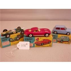 Three boxed Corgi toy cars No 155 Lotus Climax, No 226 Mini and No 310 Corvette…
