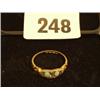 Image 1 : 18ct gold ring with two turquoise stones set with five diamonds…