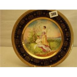 Vienna handpainted cabinet plate, 10" diameter decorated in blue and heavily gilded, of ladies by…