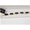 Image 1 : Joshua Lieff Designer Yellow Gold Plated  Bracelet With Large Blue Crystals