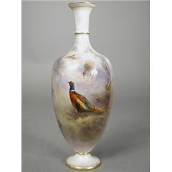 A Royal Worcester porcelain vase, decorated in the style of J.A.S. Stinton with a pheasant in woo...