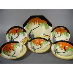 A Clarice Cliff Woodland design part dessert service viz: one large and five small bowls, printed...