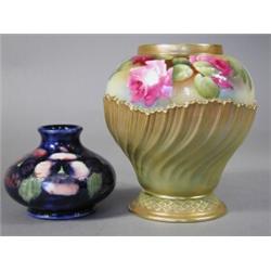 A Royal Worcester vase, decorated on the shoulder with roses, 'A. Lane', above a relief spiral fl...