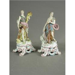 A pair of 19th century French Bow style figurines of classical ladies, representing the elements...