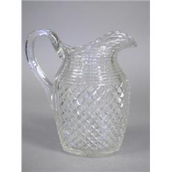 A good Regency cut glass jug, with rib cut and fine hobnail decoration, 19cm high Est. 80/120...