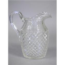 A good Regency cut glass jug, with rib cut and fine hobnail decoration, 19cm high Est. 80/120...