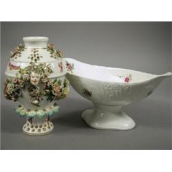 A Derby porcelain floral encrusted frill vase with face masks and painted butterflies, patch mark...