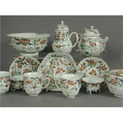A Chinese porcelain part tea set, comprising two pairs of scalloped tea bowls and saucers, three...