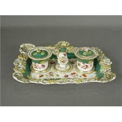 An early 19th century Derby desk stand, with foliate sprays and a moulded fruiting vine border, 2...