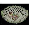 Image 1 : An oval bowl basket circa 1760, with a painted central flower spray, (chipped foot and restoratio...