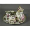 Image 1 : An outside decorated Meissen cabaret set, decorated with putti and gilt and floral borders, compr...