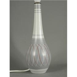 A Poole pottery free form lamp base, of slender form, with bands of blue with spiralled paintwork...