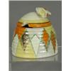 Image 1 : A Clarice Cliff beehive honey pot and lid, decorated in a geometric pattern, base with signature...