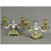 Image 1 : A pair of porcelain and gilt bronze twin branch candlesticks, 13cm Est. 150/200...