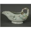 Image 1 : A Worcester 'Cabbage Leaf' sauceboat, painted with polychrome enamels (restored base, rim), 12cm...