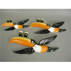 Three Guinness pottery Toucan wall ornaments, largest 25cm Est. 150/200...