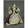 Image 1 : A Volkstedt figure of a seated lady in 18th century costume, with Capo de Monte style mark, 33cm...
