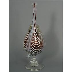 A Nailsea pair of ruby and white stripe glass bellows, 19th century Est. 120/150...