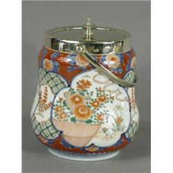 An Imari biscuit barrel with plated lid stamped Mappin Brothers Est. 100/200...