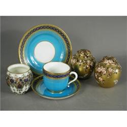 A Mintons trio, a miniature Royal Worcester jardiniFre and a pair of Coalport vases and covers, (...