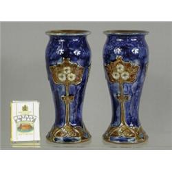 A pair of small Royal Doulton 'Art Nouveau' vases, bases initialled 'E.B.' and stamped 2418, 15cm...