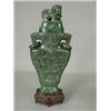 Image 1 : A late 19th century carved jade bottle vase, carved with relief palmettes, foliage and geometric...