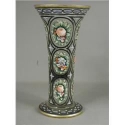 A large 19th century glass vase with a flaring rim, decorated with oval panels of hand painted fl...