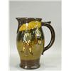 Image 1 : A Royal Doulton golf jug, painted and moulded in relief with golfers in Jacobean dress, circa 191...