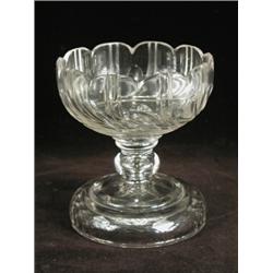 A lead crystal and cut glass bowl, probably Waterford, 20cm high Est. 100/200...