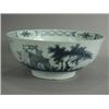 Image 1 : An 18th century Delft blue and white bowl painted with two figures in an Italianate landscape, (c...