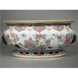 A 19th century Samson of Paris porcelain jardiniFre of oval form on a raised foot, decorated in t...