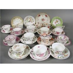 Seventeen early 19th century English porcelain tea cups and saucers, all with London shaped handl...