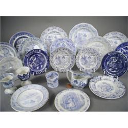 Seventeen assorted 19th century blue and white miniature plates, a miniature stone china sauce bo...