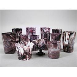 Thirteen pieces of Sowerby and George Davidson & Co pressed marbleised glass, moulded marks Est....