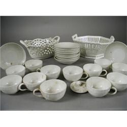 Two 19th century Berlin porcelain baskets and twenty three pieces of Berlin porcelain tea ware, a...