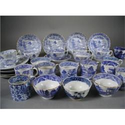 Thirty pieces of early-mid 19th century blue and white tea ware, comprising seven teacups, four t...