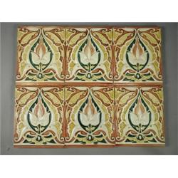 A set of six Craven Dunnill pottery architectural tiles, relief moulded with stylised flower and...