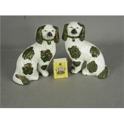 A pair of Staffordshire dogs with independent front legs (one cracked), 15cm high Est. 70/120...