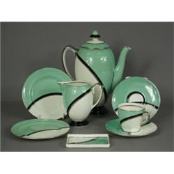 A Royal Doulton 'De Luxe' coffee set, circa 1940's, in green with black and silver banding, print...