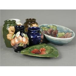 Seven pieces of modern Moorcroft pottery, oval bowl 23cm long Est. 200/300...