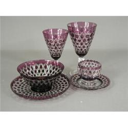 Fifteen Stephens & Williams amethyst coloured cut wine glasses (sets of 7 & 8), etched marks and...