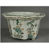 Image 1 : A 19th century Samson porcelain jardiniFre of octagonal form, with polychrome enamel floral decor...
