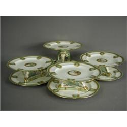 Eight pieces of 19th century Minton porcelain dessert ware, comprising four plates, four tazzas e...