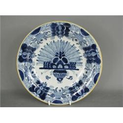 A 19th century Dutch Makkum blue and white plate, marked to the underside, 23.5cm diameter Est. 1...