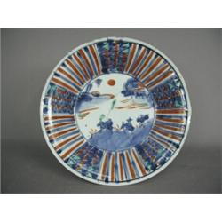 A Chinese 18th century bowl decorated with figures and mules and later green and red enamels, cha...