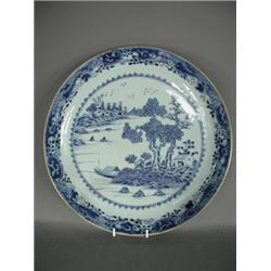 A late 18th century Chinese circular blue and white charger (restored), 33.5cm Est. 120/150...