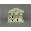Image 1 : A carved bone model of a chalet with a hinged roof and fitted interior, 10cm high Est. 70/150...